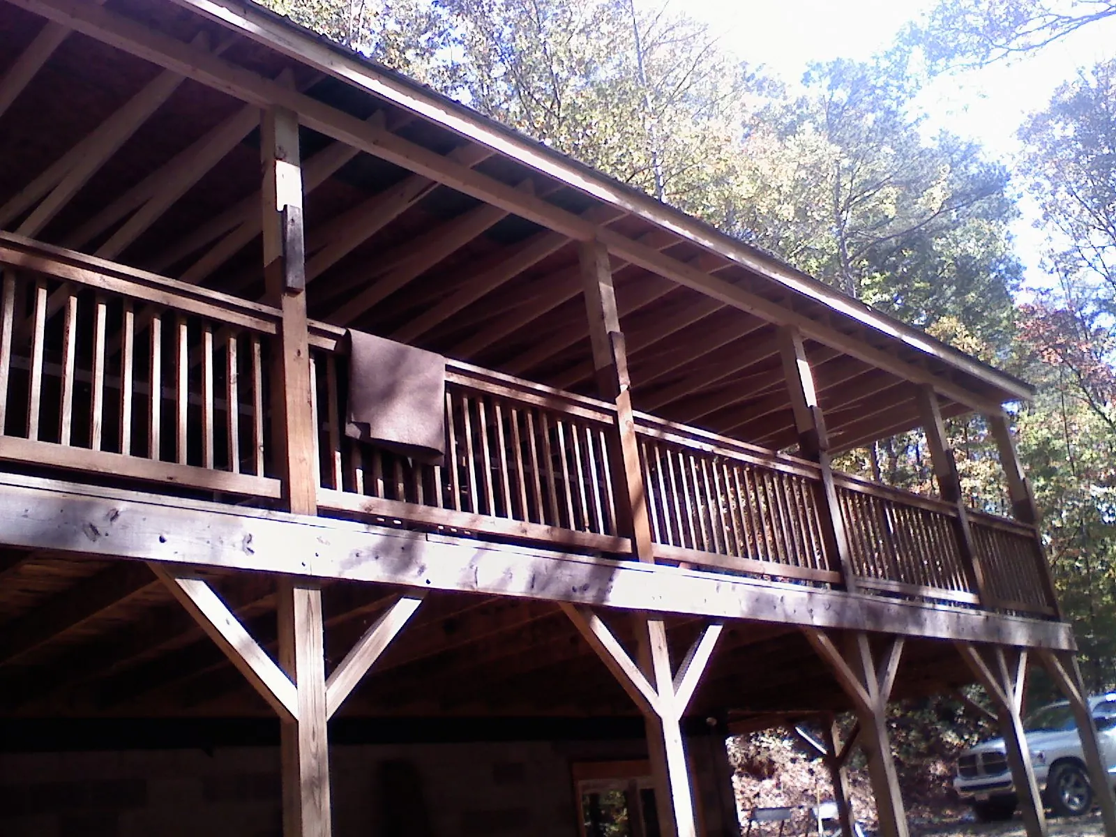 Timber framing under a new elevated porch and deck — Roof Leak Repair in Toledo by Roofing Brothers